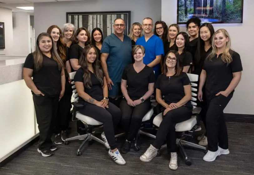 Group photo of the entire team at Strathcona Dental Clinic in Edmonton, AB